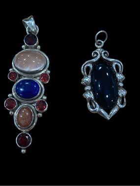 Two Beautiful Sterling Silver Pendants stamped